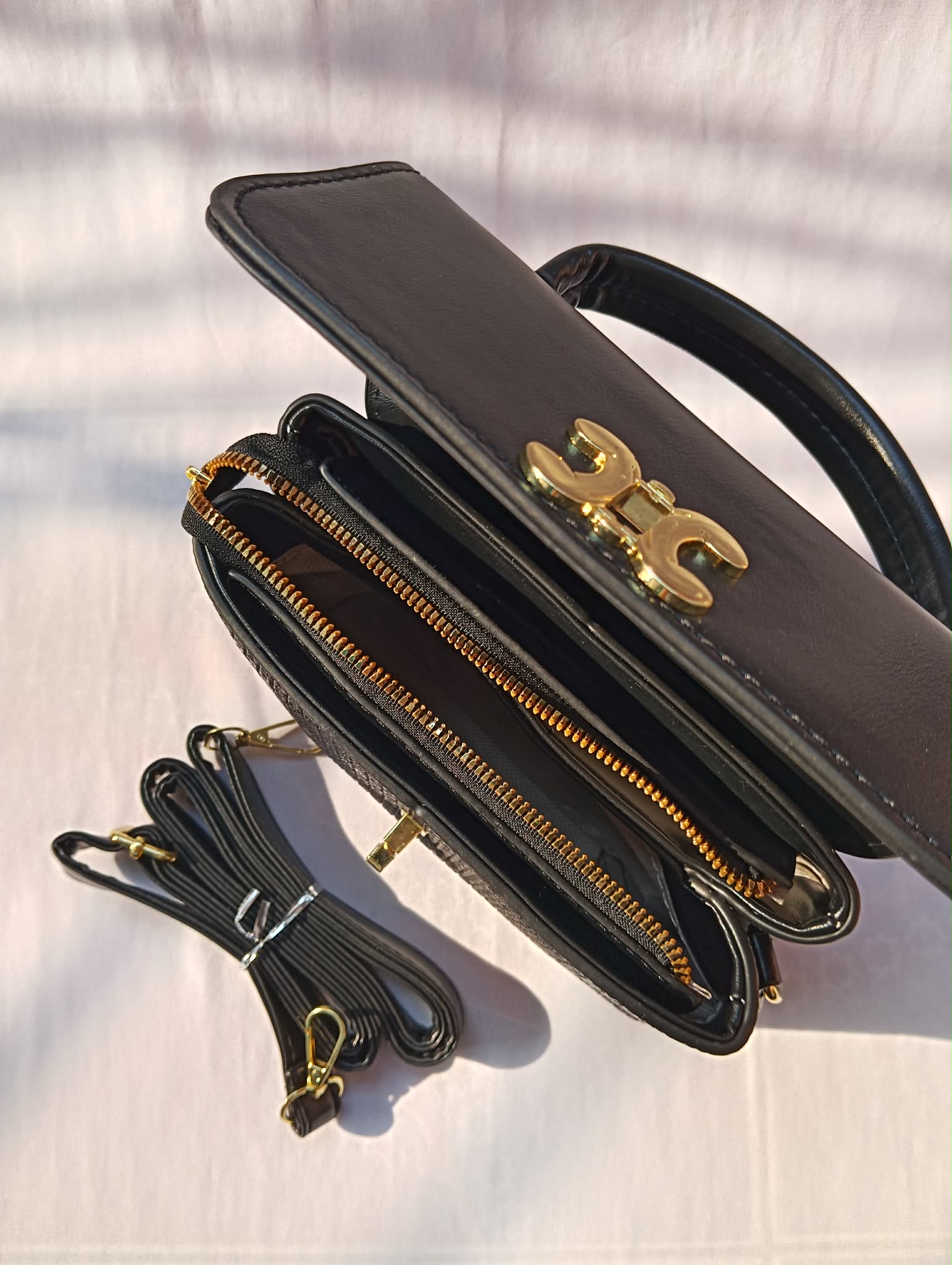 Premium Black Handbag with Gold Lock Closure - Image 5