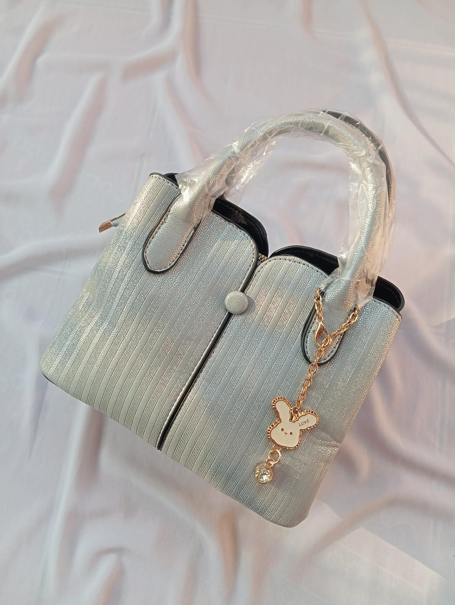 Silver Textured Bag with Rabbit Key-Chain